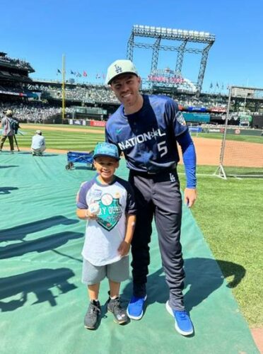 Child and baseball player