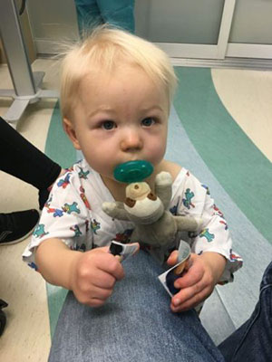 A toddler boy in a hospital