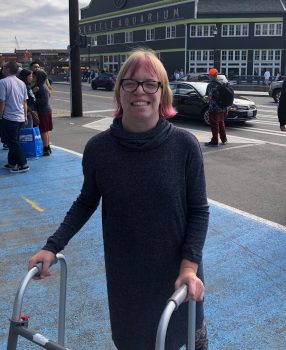 a young woman outside the Seattle Aquarium