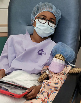 DJ and his giraffe Jax are prepped by the Seattle Children’s care team for surgery