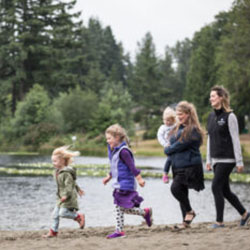 A family walks on a beach