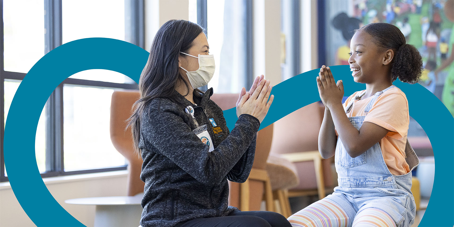 A patient speaks to a Seattle Children's provider