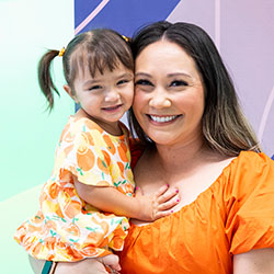 A mother holds her daughter at Seattle Children's