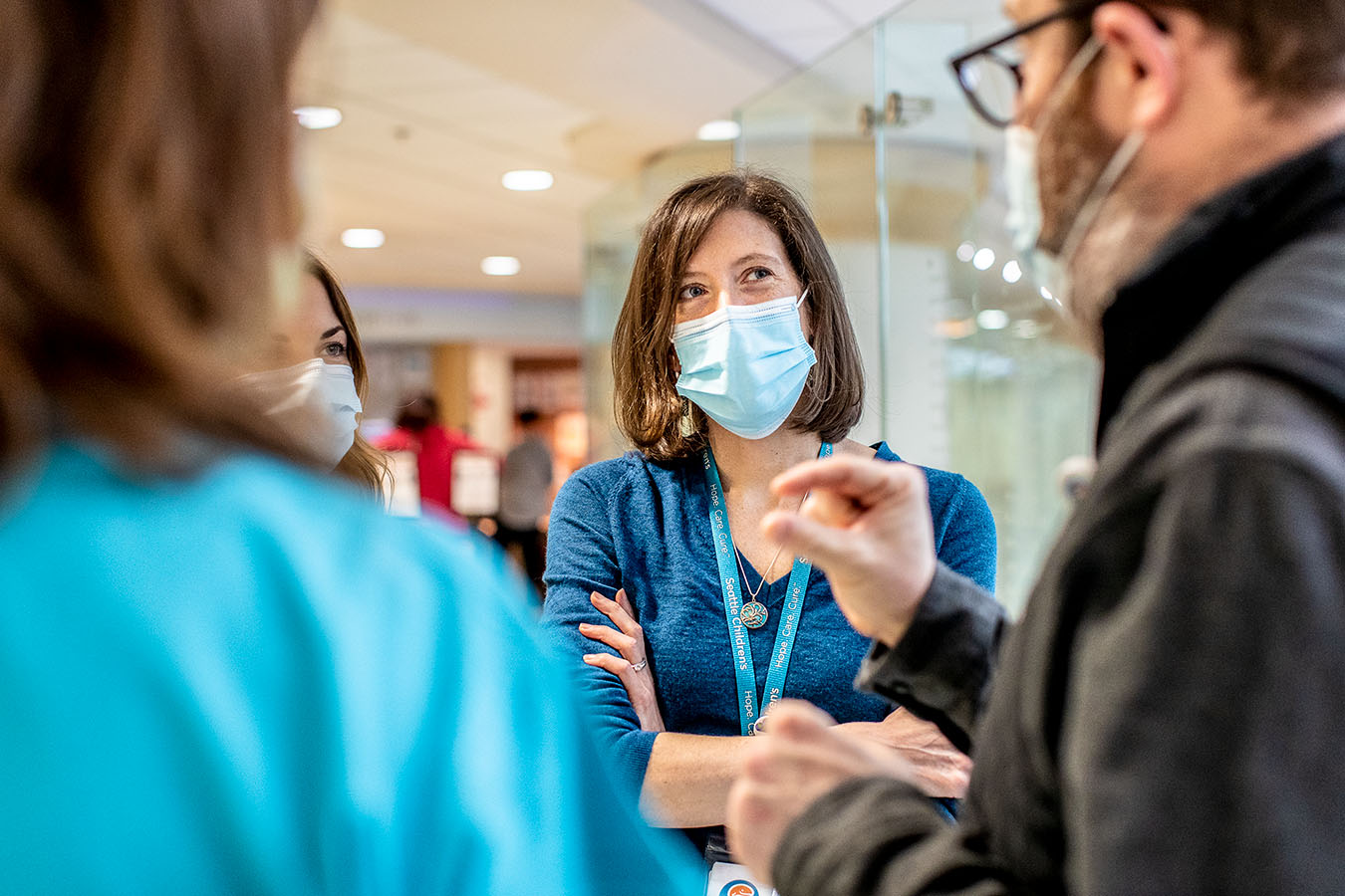 Seattle Children's Dr. Sarah Leary confers with colleagues