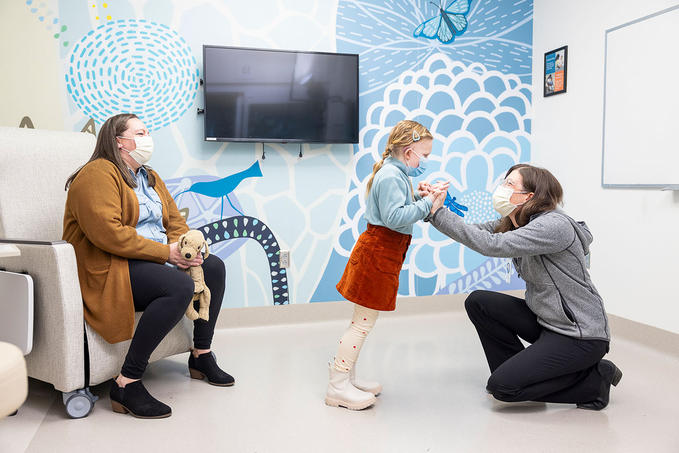 Seattle Children's Dr. Sarah Leary examines a patient