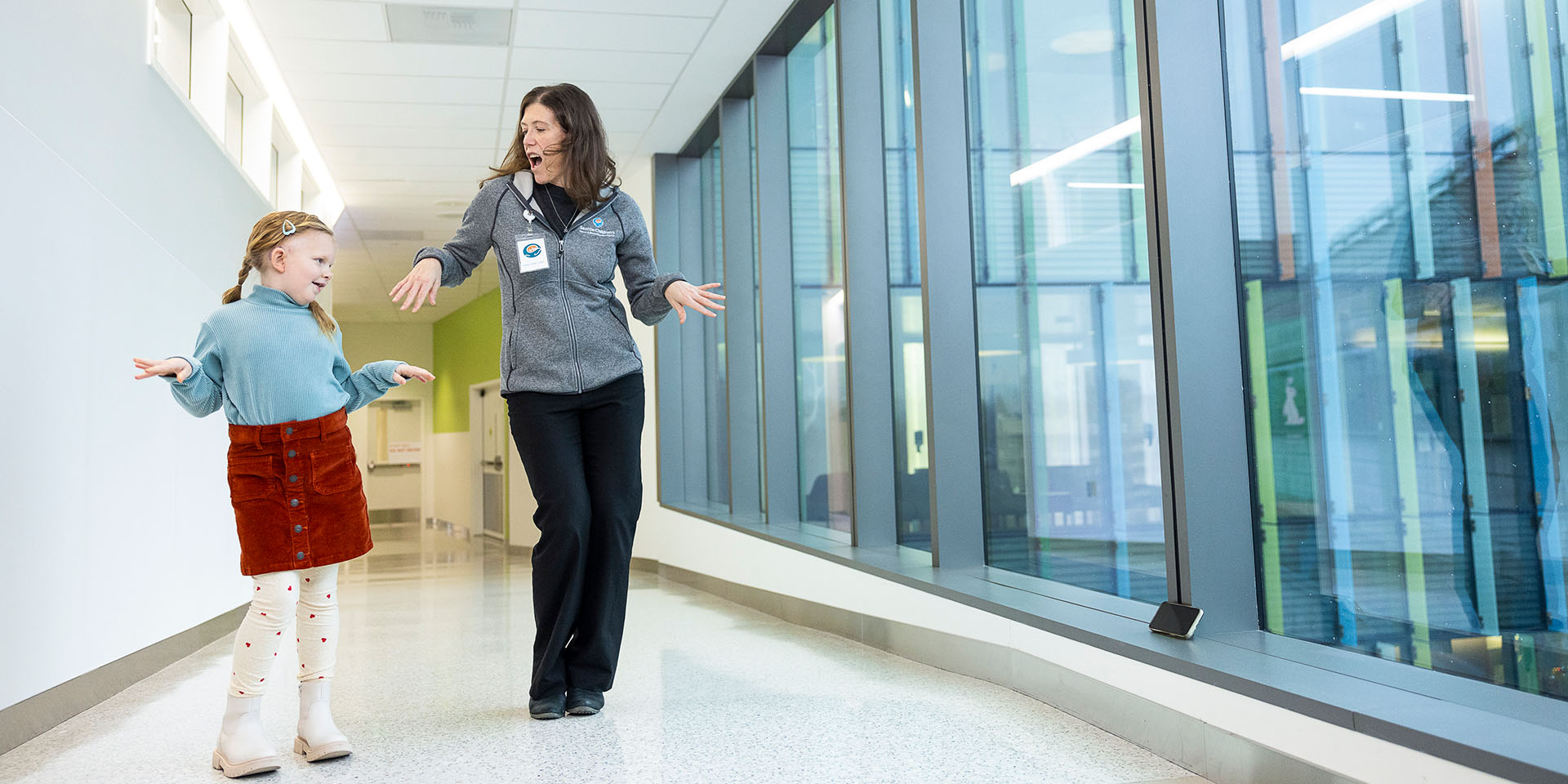 A Seattle Children's provider dancing with a patient