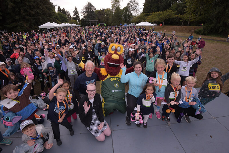 A large group of people pose for a picture