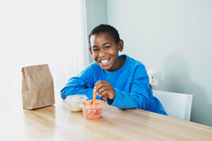 Young man having a snack