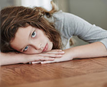 girl with head on table