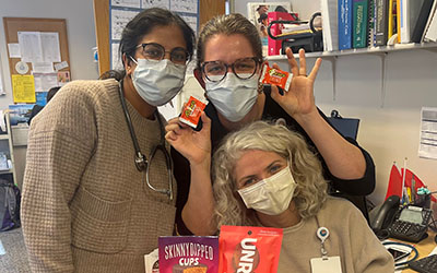 Residents pose with candy