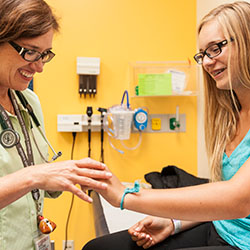 A teen girl is examined at Seattle Children's